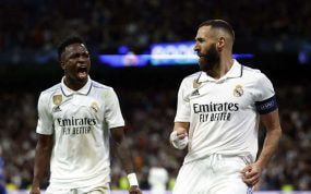 Vinicius celebra el gol de Benzema.