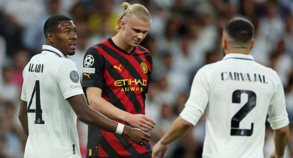 Carvajal y Alaba vigilan de cerca a Haaland.