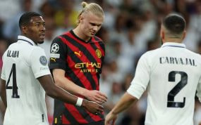 Carvajal y Alaba vigilan de cerca a Haaland.