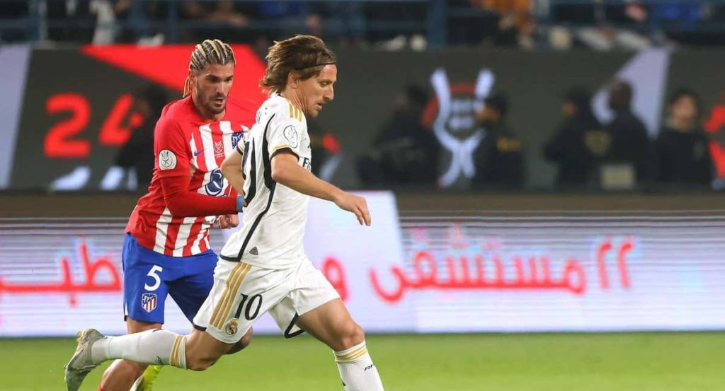 Luka Modric y Rodrigo de Paul.