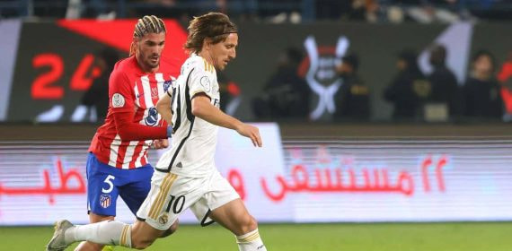 Luka Modric y Rodrigo de Paul.