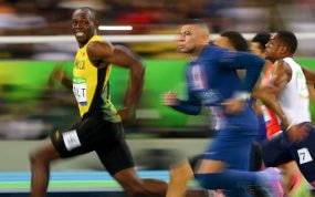 Usain Bolt, plusmarquista mundial de los 100 y los 200 metros, y Kylian Mbappé.