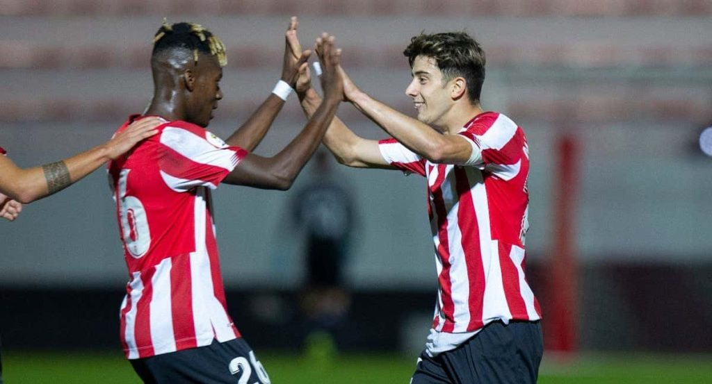 Los 'Nicos' celebran un gol con el Athletic.