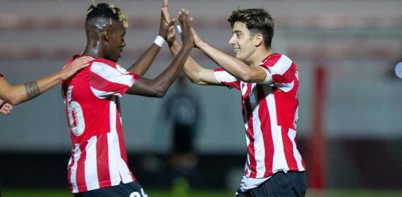 Los 'Nicos' celebran un gol con el Athletic.