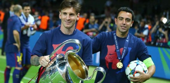 Leo Messi y Xavi Hernández celebran la Champions lograda en Berlín en 2015.
