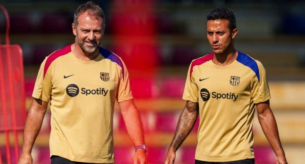 Thiago Alcántara con Hansi Flick.