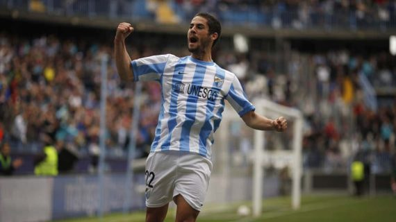 Un jovencísimo Isco celebra un gol con el Málaga.