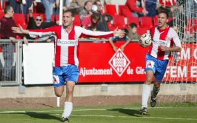 Jito Silvestre celebrando un gol con el Girona junto a Migue.