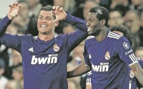 Cristiano y Adebayor.