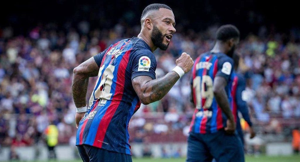 Memphis celebra un gol con el Barcelona esta temporada.