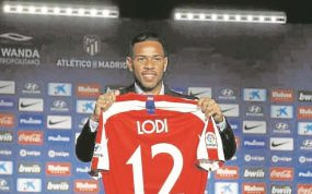 Renan Lodi, en su presentación con el Atlético.