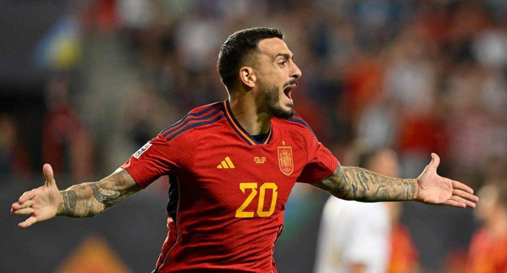 Joselu, en un partido con España.
