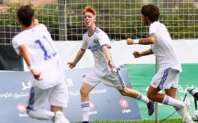 Marc Cucalón celebra un gol con el Real Madrid.