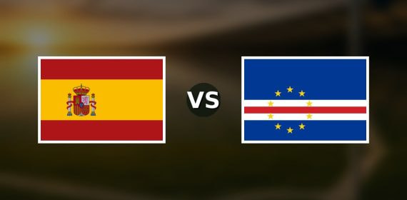 Banderas de España y Cabo Verde enfrentadas sobre un campo de fútbol difuminado, pronóstico del Mundial 2026