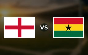 Banderas de Inglaterra y Ghana enfrentadas sobre un campo de fútbol difuminado, pronóstico del Mundial 2026